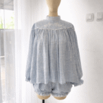 Light blue gingham top and bloomers set with delicate embroidery, manufactured by MARI Garment clothing production in Bali.