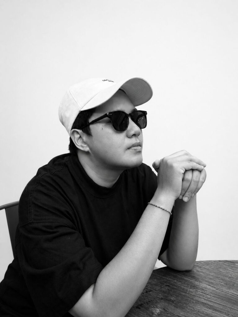 Black and white portrait of the Co-Founder of MARI Stitch, representing the leadership team of our premium clothing manufacturer in Bali.