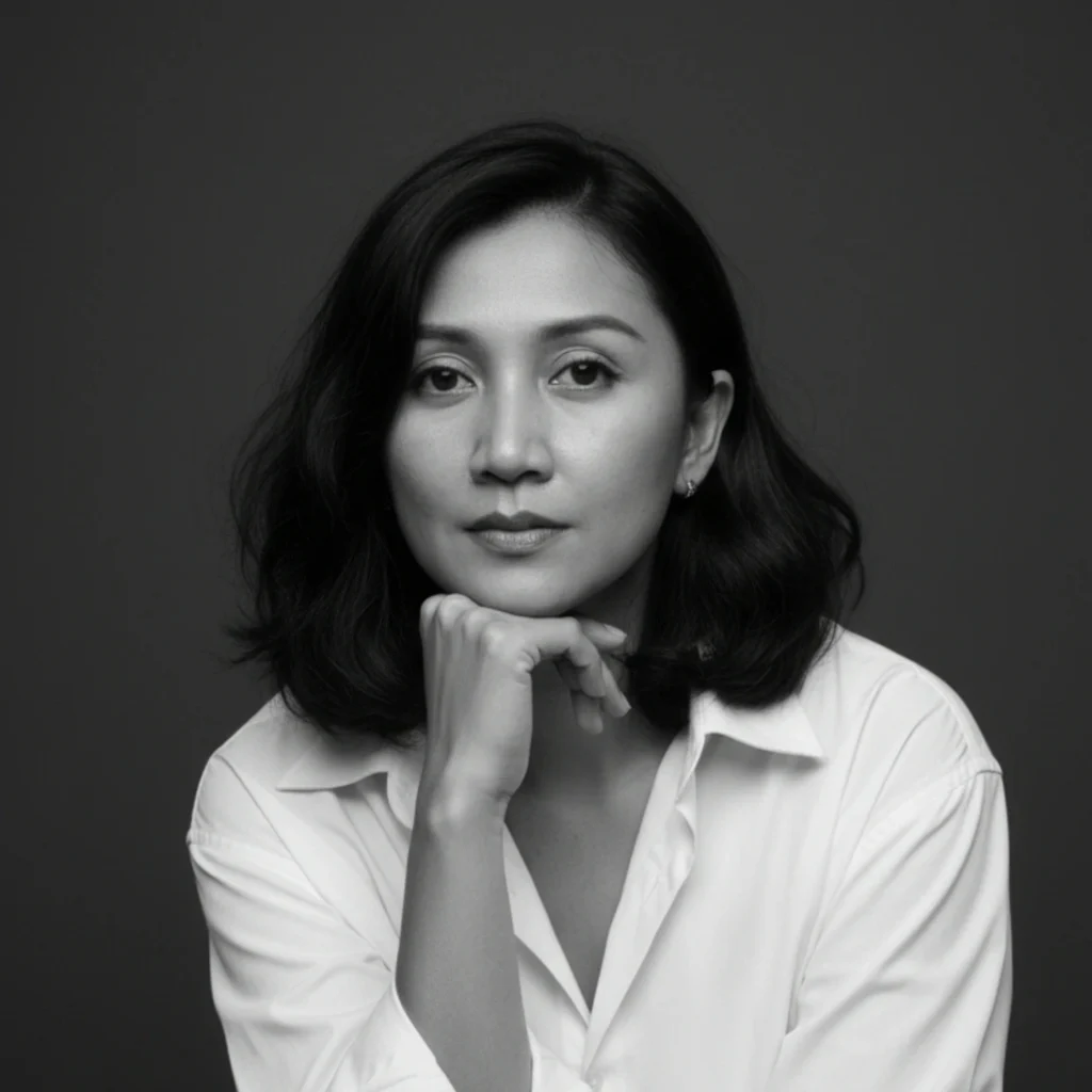 Contact. Black and white professional portrait of the founder of MARI Stitch, a leading premium garment and clothing manufacturer in Bali.